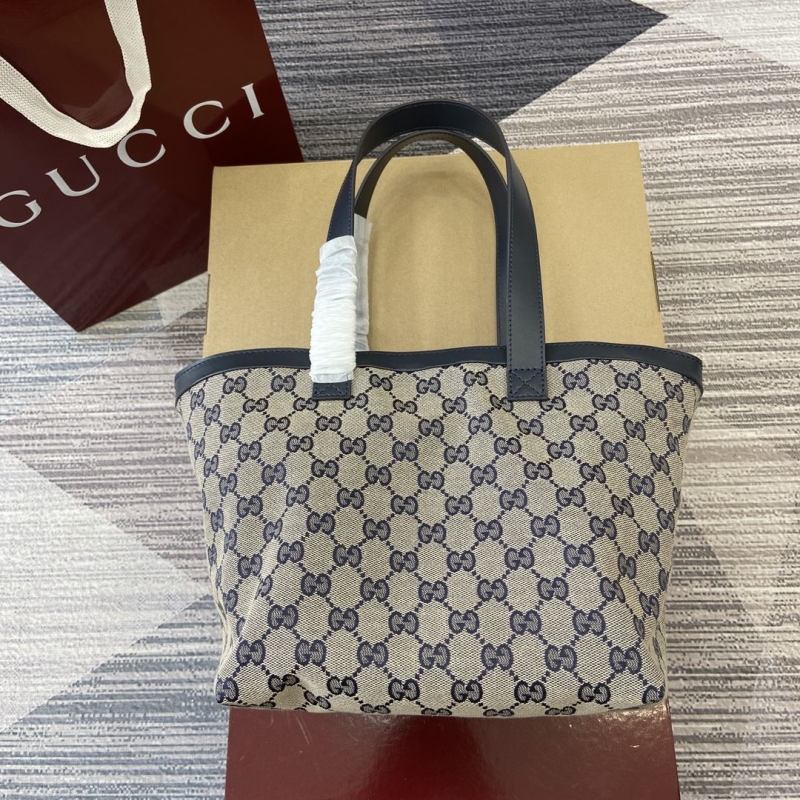 G*u*i shopping bags